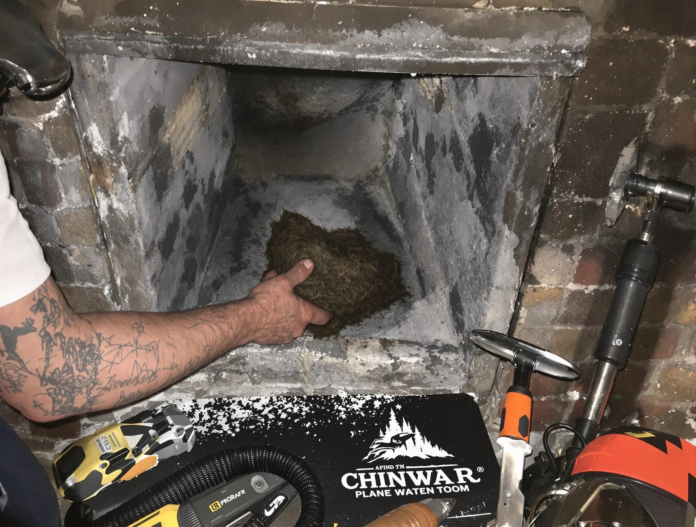 Old Bridge Chimney Sweep safely removing debris and screening chimney in Old Bridge, NJ